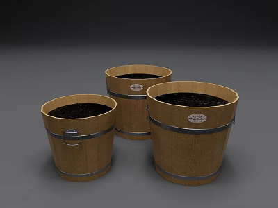Three Decorative Wooden Planter Buckets With Metal Bands And Soil Inside 3d model