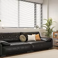 Black Leather Two Seater Sofa with Potted Plant and Bookshelf by Window Blinds