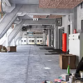 Industrial Workshop Interior Featuring Concrete Structures Exposed Pipes Boxes And Equipment