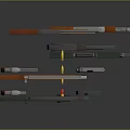 Toy Weapons Collection Featuring Various Plastic Guns With Orange Green And Gray Designs
