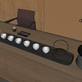Minimalist Tea Set With Black Tray White Cups Teapot And Green Plant On Wooden Table
