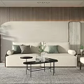 Modern Beige Sofa and Black Coffee Table Set with Green Cushions Plants and Wooden Decor