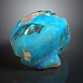 Blue Artisan Sculpture Carving With Textured Surface And Weathered Details