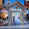 Tibetan Style Commercial Street With Traditional Archway Night Lights Pedestrians And Colorful Shop Signboards
