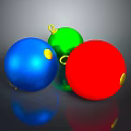 Colorful Christmas Balls In Blue Green Red With Golden Loops On Dark Background And Reflections