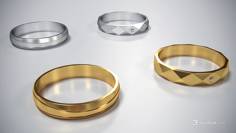 Stylish Gold And Silver Rings With Sleek Geometric Textured Designs 3d model 