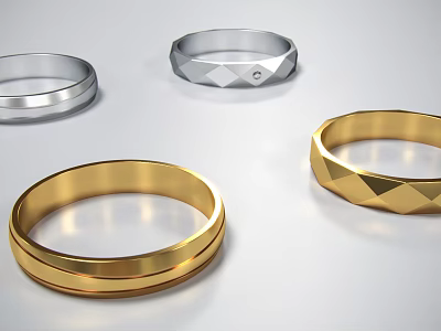 Stylish Gold And Silver Rings With Sleek Geometric Textured Designs 3d model