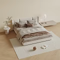 Modern Double Bed With Upholstered Headboard Plush Pillows And Beige Rug On Wooden Floor