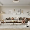 Modern Living Room Interior With Beige Sofa Decorative Paintings Floor Lamp And Wooden Coffee Tables