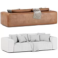 Stylish Brown and Gray Two-Seater Sofa with Patterned Pillows and Throw Blanket