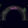 Night View Of Illuminated Decorative Arch With Sunrise Sign And Palm Trees