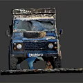 Vintage Blue Silver Off Road Vehicle With Roof Rack Front Spare Tire On Stone Pavement