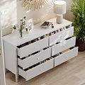 White Storage Cabinet With Drawers Golden Sunburst Mirror Table Lamp In Modern Bright Room