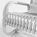 Rattan Rocking Leisure Chair with Neutral Cushion and Geometric Pattern Design