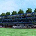 Multilevel Parking Lot With Blue Structure Various Colored Cars Green Trees And Grassland