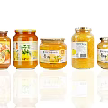 Assorted Honey Yuzu And Lemon Tea Drinks In Glass Jars