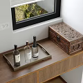 Elegant Decorative Ornament Set With Tray And Bottles And Carved Wooden Box On Wooden Countertop