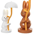 Cute Rabbit Shaped Table Lamp With White Brown Body Orange Stand And Yellow Light