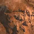 Rugged Rocky Terrain With Natural Geological Formations And Eroded Surfaces