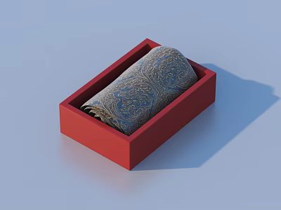 Red Box With Rolled Decorative Fabric Featuring Intricate Blue Patterns 3d model