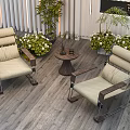 Garden Landscape with Outdoor Leisure Chairs Round Table and Lush Greenery on Wooden Deck