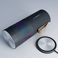 Sleek Black Portable Speaker With Leather Strap Colorful Sound Wave Design And Wireless Charging Pad