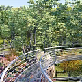Road Facilities Surrounded by Trees and Greenery Sloped Path with Railings in Urban Park Area