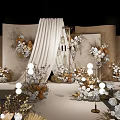 Elegant Wedding Banquet Hall With Round Stage And White Gold Floral Decorations