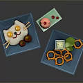 Cat Shaped Rice With Strawberries Pink Ice Cream Cone And Onion Rings On Blue Plates