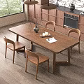 Wooden Dining Table With Four Chairs Vase Dried Branches Candles Tray And Open Book