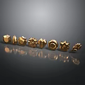 Golden Decorative Ornaments Featuring Various Geometric And Floral Shapes On Dark Surface
