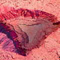 Stunning Red Natural Landscape Featuring Heart Shaped Depression And Vibrant Terrain