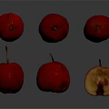 Red Fresh Crab Apples Displayed With One Halved On Shiny Surface 3d model