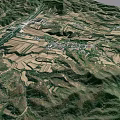 Aerial View Of Rural Mountainous Landscape With River Road And Farmland