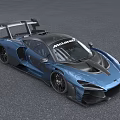 McLaren Blue Sports Car With Aerodynamic Rear Wing And Sporty Exterior Design