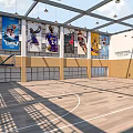 Spacious Basketball Gym Featuring Open Ceiling Suspended Lights Basketball Player Posters Wooden Floor And Hoop