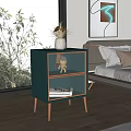 Teal Bedside Table with Gold Legs Two Drawers Glass Details and Vase in Bedroom