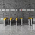 Public Facility Entrance With Yellow Top Turnstiles Gray Wall Green Arrow Devices And Red Button