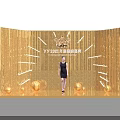 YY2021 Annual Ceremony Scene With Golden Tassel Backdrop Woman In Black Dress And Decorative Balls
