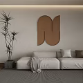 Modern Brown Geometric Wall Decor In Living Room With Sofa And Plant