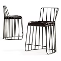 Modern Outdoor Chair With Stylish Metal Frame And Comfortable Black Seat Cushion