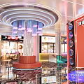 Modern Elegant Restaurant Interior With Round Chandelier Red Pillar Glass Display Windows And Neon Signs