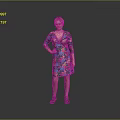 Woman in Colorful Floral Dress Standing with One Hand on Hip Against Gray Background