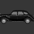 Classic Black Vintage Car With Rounded Contours And Chrome Grille Details