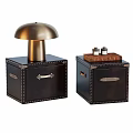 Stylish Riveted Bedside Tables With Golden Table Lamp Books And Small Bottles