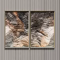 Gold Framed Two Piece Wall Art With Textured Earth Tone Patterns on Gray Striped Wall