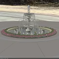 Ornamental Multi Tiered Water Fountain With Circular Flower Bed And Illuminated Lights