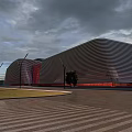 Modern Architecture Aerial Planning With Striped Facade Red Accents Plaza And Green Space