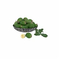 Fresh Ripe Green Feijoas in Black Bowl with Leaves and Sliced Fruit