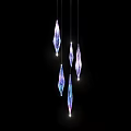 Five Diamond Shaped Purple And Blue Gradient Pendant Lights Glowing On Black Background